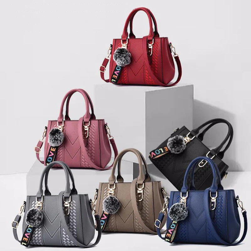 Amelia™ - Bolsa mensageiro bordada