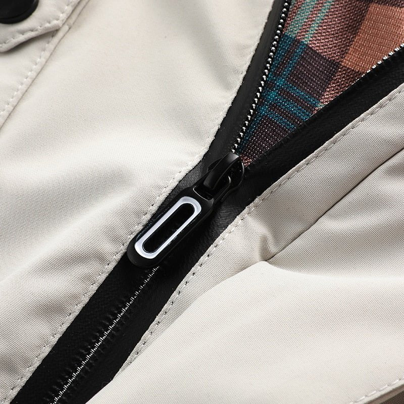 Logan™ – Bequeme, winddichte und wasserdichte Jacke mit mehreren Taschen