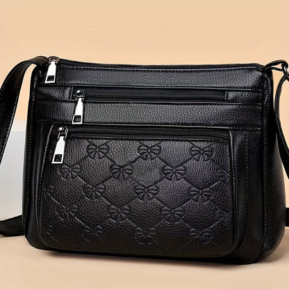 Bolsa acolchoada crossbody - couro sintético, cor sólida, enfeite de borla, fecho de zíper