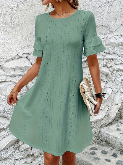 Vestido com gola redonda bordado com ilhós, manga casual com babados para primavera/verão.