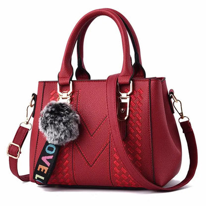 Amelia™ - Bolsa mensageiro bordada 