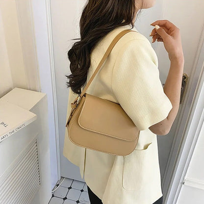 Avery™ Classic Saddle | Bolsa tiracolo