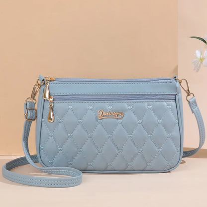 Lily™ - Bolsa mensageiro bordada 