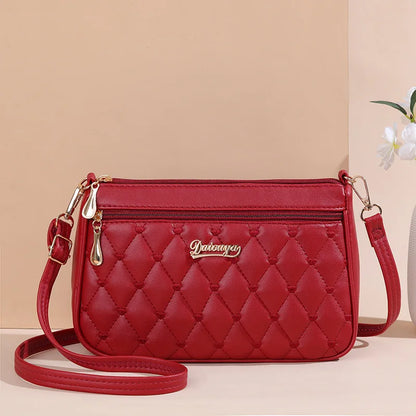 Lily™ - Bolsa mensageiro bordada 