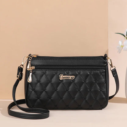Lily™ - Bolsa mensageiro bordada 
