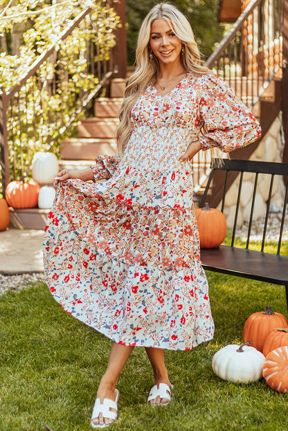 Vestido midi de manga comprida com babados e estampa floral