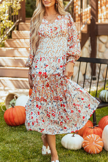 Vestido midi de manga comprida com babados e estampa floral