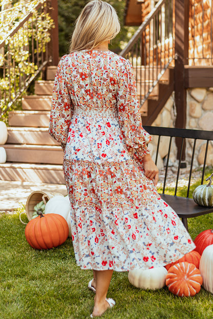 Vestido midi de manga comprida com babados e estampa floral